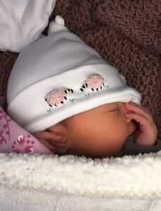 Sweet newborn baby hat with embroidered sheep