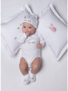Baby hats, onesies, booties, and pillows