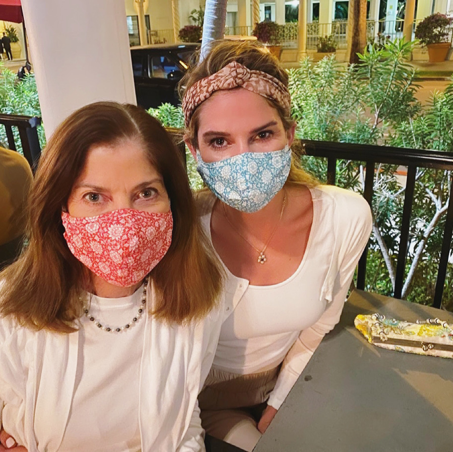 Two women wearing Jacaranda Living face masks during the coronavirus pandemic.