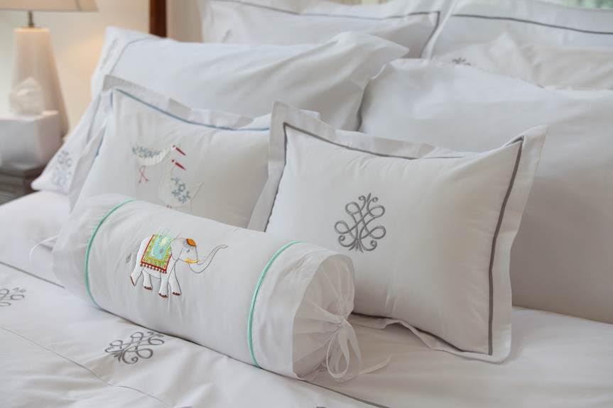 beautiful embroidered bed linens and pillows